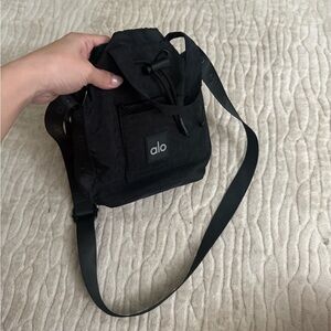 Black ALO water bottle holder bucket crossbody bag